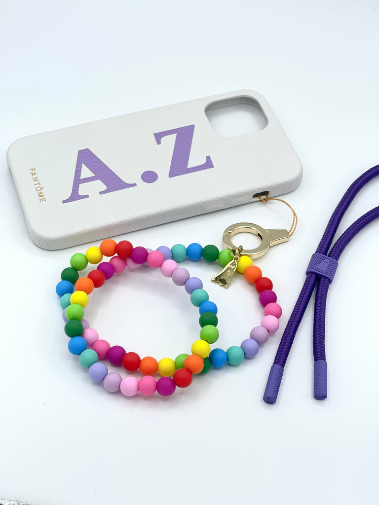 Leather loop personalised iPhone case with colourful bead wrist strap and rope crossbody strap. 
